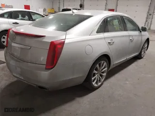 2015 Cadillac XTS Luxury with VIN 2G61N5S3XF9235369, listed as a IAAI auction lot 41461663 with 80,225 mi miles. Bid and sale history available at carsss.com. Image 4.