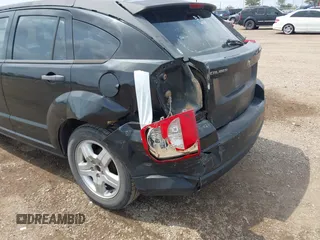 2008 Dodge Caliber SE with VIN 1B3HB28B08D659538, listed as a IAAI auction lot 42083010 with 263,118 mi miles. Bid and sale history available at carsss.com. Image 6.