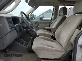 2003 Volkswagen EuroVan MV с VIN WV2NB47083H002700, выставлен на аукционе Copart как лот 76117874 с пробегом 186 942 миль миль и На запчасти • Non repairable. История ставок и продаж доступна на DreamBid. Изображение 7.