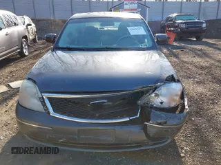 2005 Ford Five Hundred SE z VIN 1FAFP231X5G145153, wystawiony jako IAAI lot #42059747 z przebiegiem 59 114 mil mil oraz . Historia ofert i sprzedaży dostępna na DreamBid. Obrazek 12.