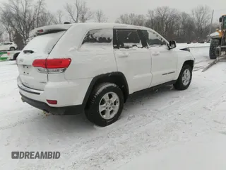 2017 Jeep Grand Cherokee Laredo with VIN 1C4RJEAG9HC854492, listed as a IAAI auction lot 41184619 with 134,839 mi miles. Bid and sale history available at carsss.com. Image 4.