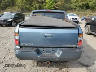 2007 Honda Ridgeline RTX z VIN 2HJYK16317H514476, wystawiony jako Copart lot #74274954 z przebiegiem Nie podano mil oraz Nie do naprawy • Non repairable. Historia ofert i sprzedaży dostępna na DreamBid. Obrazek 6.