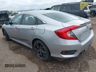 2021 Honda Civic Sport with VIN 2HGFC2F83MH510243, listed as a IAAI auction lot 41856857 with 95,739 mi miles and . Bid and sale history available at DreamBid. Image 3.