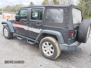 2018 Jeep Wrangler JK Unlimited Sport S with VIN 1C4BJWDG8JL895981, listed as a IAAI auction lot 42048316 with 95,457 mi miles. Bid and sale history available at carsss.com. Image 3.