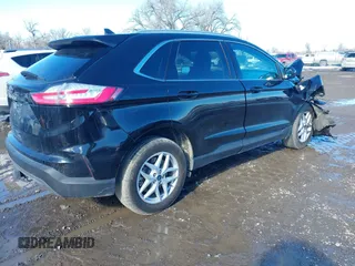 2021 Ford Edge SEL with VIN 2FMPK4J96MBA56084, listed as a IAAI auction lot 41637629 with 31,915 mi miles. Bid and sale history available at carsss.com. Image 4.