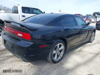 2011 Dodge Charger Rallye with VIN 2B3CL3CG9BH503623, listed as a IAAI auction lot 42102239 with 129,488 mi miles. Bid and sale history available at carsss.com. Image 4.
