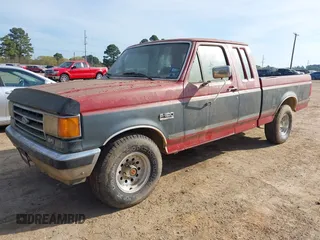 1991 Ford F-150 with VIN 1FTEX15N2MKB29623, listed as a IAAI auction lot 41880826 with 14,556 mi miles. Bid and sale history available at carsss.com. Image 2.