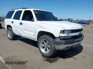 2001 Chevrolet Tahoe LT with VIN 1GNEC13T01J206365, listed as a IAAI auction lot 41960144 with 243,884 mi miles. Bid and sale history available at carsss.com. Image 1.