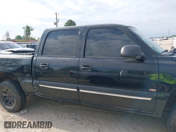 2005 Chevrolet Silverado 1500 LT with VIN 2GCEK13T551277184, listed as a IAAI auction lot 42028710 with Not Provided miles and . Bid and sale history available at DreamBid. Image 13.