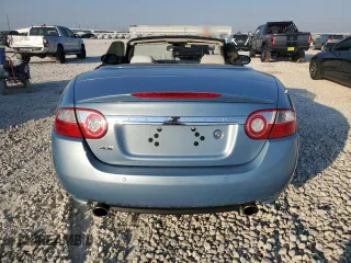 2007 Jaguar XK with VIN SAJWA44BX75B09612, listed as a Copart auction lot 75139114 with 86,094 mi miles and Salvage Title. Bid and sale history available at carsss.com. Image 6.