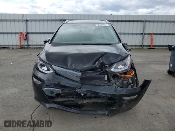 2018 Chevrolet Bolt EV Premier with VIN 1G1FX6S09J4122445, listed as a Copart auction lot 55230635 with 33,569 mi miles and Salvage title. Bid and sale history available at DreamBid. Image 5.