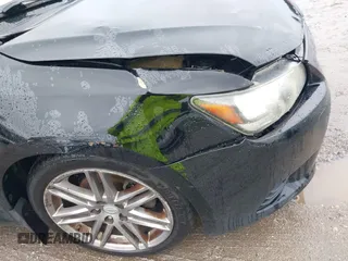 2013 Scion tC with VIN JTKJF5C79D3051664, listed as a IAAI auction lot 42027579 with 211,322 mi miles. Bid and sale history available at carsss.com. Image 13.
