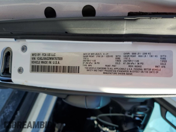 2021 Jeep Wrangler Sport with VIN 1C4GJXAG2MW767559, listed as a Copart auction lot 82108354 with 32,728 mi miles and Salvage Title. Bid and sale history available at DreamBid. Image 12.
