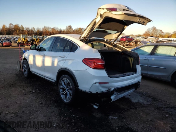 2015 BMW X4 xDrive28i with VIN 5UXXW3C58F0M88241, listed as a Copart auction lot 66591742 with 95,658 mi miles. Bid and sale history available at carsss.com. Image 3.