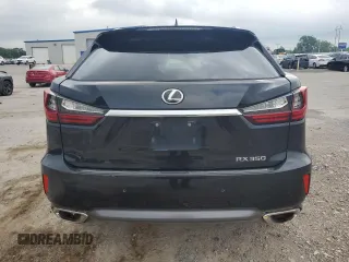 2017 Lexus RX 350 with VIN 2T2BZMCA9HC129460, listed as a Copart auction lot 57301995 with 163,128 mi miles and Salvage title. Bid and sale history available at DreamBid. Image 6.