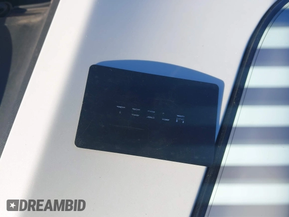 2023 Tesla Model Y Long Range with VIN 7SAYGAEE3PF753657, listed as a IAAI auction lot 41668917 with 33,301 mi miles and . Bid and sale history available at DreamBid. Image 11.