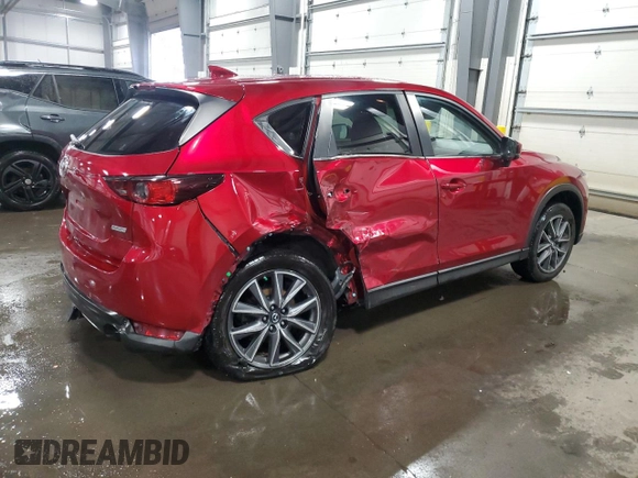 2018 Mazda CX-5 Touring z VIN JM3KFBCM5J0462676, wystawiony jako Copart lot #57892015 z przebiegiem 76 566 mil mil oraz Szkoda całkowita • Salvage title. Historia ofert i sprzedaży dostępna na DreamBid. Obrazek 3.