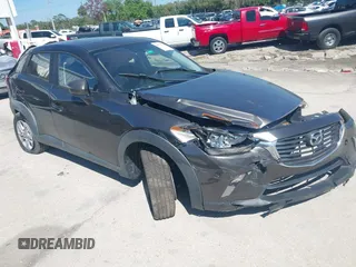 2016 Mazda CX-3 Touring with VIN JM1DKBC7XG0114940, listed as a IAAI auction lot 41777630 with 71,275 mi miles and . Bid and sale history available at DreamBid. Image 1.