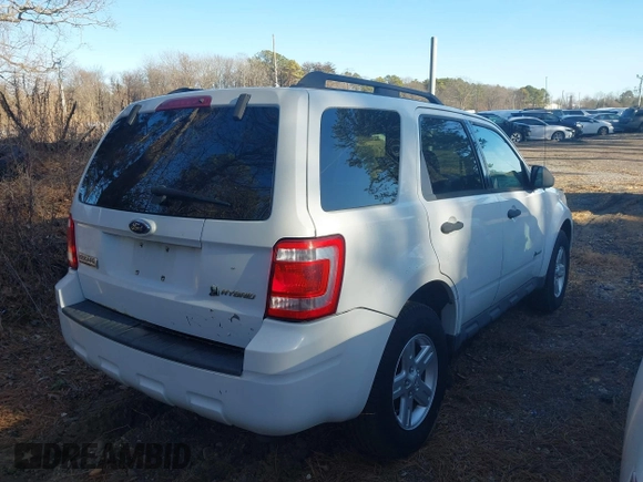 2009 Ford Escape Hybrid with VIN 1FMCU59309KA42631, listed as a IAAI auction lot 41809054 with 140,696 mi miles and . Bid and sale history available at DreamBid. Image 4.