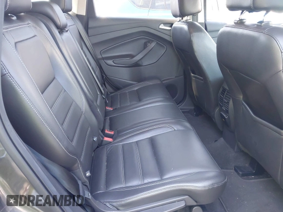 2017 Ford Escape SE z VIN 1FMCU0GDXHUB66813, wystawiony jako IAAI lot #42056150 z przebiegiem 86 915 mil mil oraz . Historia ofert i sprzedaży dostępna na DreamBid. Obrazek 8.