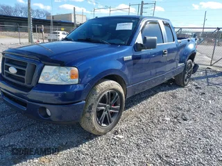 2007 Ford F-150 STX with VIN 1FTRX02W57KD56589, listed as a IAAI auction lot 41189911 with 140,093 mi miles. Bid and sale history available at carsss.com. Image 2.