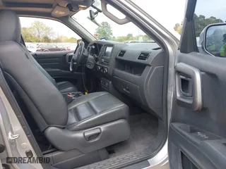 2014 Honda Ridgeline SE with VIN 5FPYK1F62EB013329, listed as a IAAI auction lot 41876728 with 127,014 mi miles. Bid and sale history available at carsss.com. Image 5.