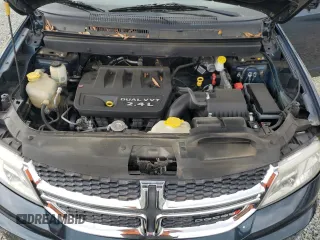 2013 Dodge Journey American Value with VIN 3C4PDCAB6DT577273, listed as a Copart auction lot 50627295 with 139,775 mi miles and Salvage title. Bid and sale history available at DreamBid. Image 14.
