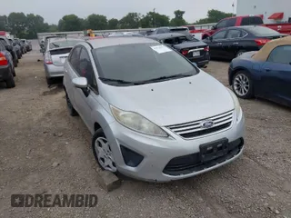 2013 Ford Fiesta SE with VIN 3FADP4BJXDM220183, listed as a IAAI auction lot 42026592 with 153,396 mi miles. Bid and sale history available at carsss.com. Image 1.