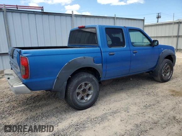 2001 Nissan Frontier SE with VIN 1N6ED27T91C390230, listed as a Copart auction lot 58844905 with 157,883 mi miles and Salvage title. Bid and sale history available at DreamBid. Image 3.
