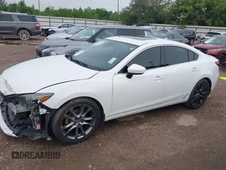 2016 Mazda 6 i Grand Touring with VIN JM1GJ1W54G1429179, listed as a IAAI auction lot 42117223 with 142,319 mi miles and . Bid and sale history available at DreamBid. Image 14.
