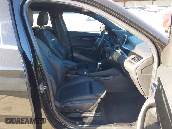 2019 BMW X2 sDrive28i with VIN WBXYJ3C50KEP77327, listed as a IAAI auction lot 40922194 with 94,672 mi miles. Bid and sale history available at carsss.com. Image 5.