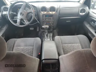 2006 GMC Envoy SLT with VIN 1GKDT13S562338202, listed as a Copart auction lot 87326504 with 158,468 mi miles and Clean Title. Bid and sale history available at carsss.com. Image 8.