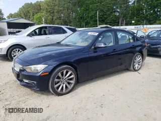2012 BMW 3 Series 328i with VIN WBA3A5C53CF257019, listed as a Copart auction lot 61925885 with 125,184 mi miles and Salvage title. Bid and sale history available at DreamBid. Image 1.