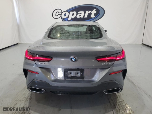 2025 BMW 8 Series 840i with VIN WBAAE4C01SCS11313, listed as a Copart auction lot 73431104 with 4,605 mi miles and Clean Title. Bid and sale history available at carsss.com. Image 6.
