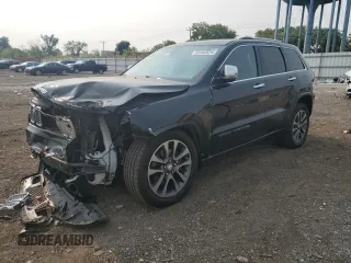 2017 Jeep Grand Cherokee Overland with VIN 1C4RJFCT8HC809088, listed as a Copart auction lot 59182625 with 73,285 mi miles and Salvage title. Bid and sale history available at DreamBid. Image 1.