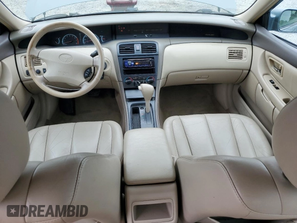 2000 Toyota Avalon XL with VIN 4T1BF28B2YU045935, listed as a Copart auction lot 57147225 with 164,261 mi miles and Salvage title. Bid and sale history available at DreamBid. Image 8.