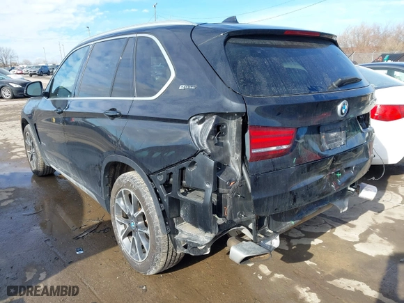 2018 BMW X5 xDrive40e iPerformance with VIN 5UXKT0C52J0W02406, listed as a IAAI auction lot 41449943 with 74,215 mi miles. Bid and sale history available at carsss.com. Image 3.