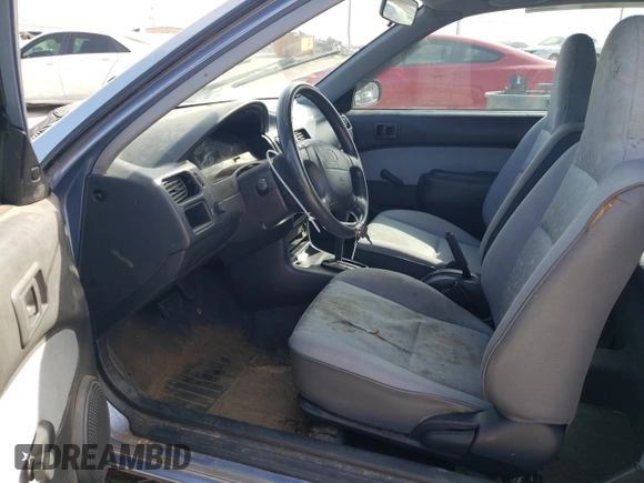 1997 Toyota Tercel CE z VIN JT2AC52L7V0212023, wystawiony jako Copart lot #49150285 z przebiegiem 74 742 mil mil oraz Czysty tytuł • Clean title. Historia ofert i sprzedaży dostępna na DreamBid. Obrazek 7.