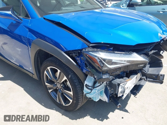 2022 Lexus UX with VIN JTHX3JBH0N2049742, listed as a IAAI auction lot 41917341 with 18,728 mi miles. Bid and sale history available at carsss.com. Image 17.