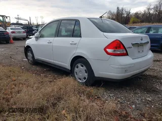 2009 Nissan Versa 1.8 S with VIN 3N1BC11E49L416720, listed as a IAAI auction lot 40960069 with 130,131 mi miles. Bid and sale history available at carsss.com. Image 3.