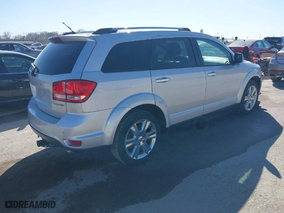 2014 Dodge Journey Limited with VIN 3C4PDCDG7ET219835, listed as a IAAI auction lot 41755551 with 151,332 mi miles. Bid and sale history available at carsss.com. Image 4.