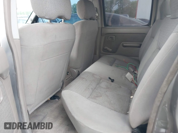 2003 Nissan Frontier XE z VIN 1N6ED29X93C444600, wystawiony jako IAAI lot #42097322 z przebiegiem 317 599 mil mil oraz . Historia ofert i sprzedaży dostępna na DreamBid. Obrazek 8.