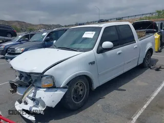 2002 Ford F-150 XLT with VIN 1FTRW07L32KD85390, listed as a IAAI auction lot 42193738 with Not Provided miles and . Bid and sale history available at DreamBid. Image 2.