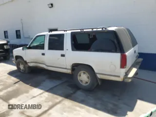 1999 Chevrolet Suburban with VIN 3GNFK16R4XG190883, listed as a Copart auction lot 58324415 with 228,782 mi miles and Salvage title. Bid and sale history available at DreamBid. Image 2.
