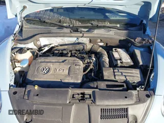 2014 Volkswagen Beetle Turbo R-Line with VIN 3VWVT7AT9EM661347, listed as a IAAI auction lot 41336295 with 61,068 mi miles and . Bid and sale history available at DreamBid. Image 10.