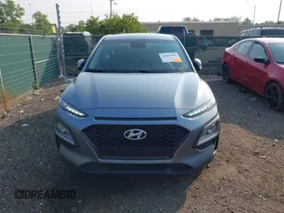 2021 Hyundai Kona SE with VIN KM8K12AA4MU614133, listed as a IAAI auction lot 42404789 with 8,956 mi miles and . Bid and sale history available at DreamBid. Image 12.