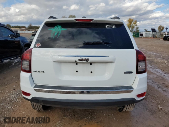 2016 Jeep Compass High Altitude with VIN 1C4NJDEB3GD797691, listed as a Copart auction lot 80340604 with 95,404 mi miles and Salvage title. Bid and sale history available at DreamBid. Image 6.