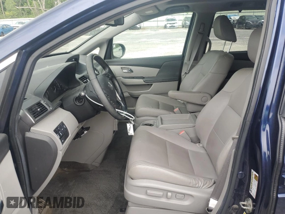2014 Honda Odyssey EX-L with VIN 5FNRL5H63EB013483, listed as a Copart auction lot 63002435 with 127,059 mi miles and Salvage title. Bid and sale history available at DreamBid. Image 7.