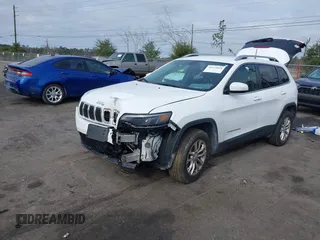 2019 Jeep Cherokee Latitude with VIN 1C4PJMCX0KD336934, listed as a IAAI auction lot 41172828 with 47,477 mi miles. Bid and sale history available at carsss.com. Image 2.