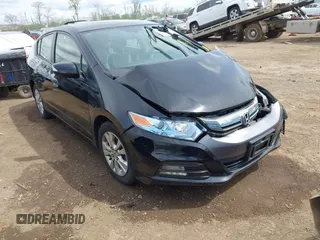2014 Honda Insight EX z VIN JHMZE2H75ES001709, wystawiony jako IAAI lot #42086181 z przebiegiem 103 045 mil mil oraz . Historia ofert i sprzedaży dostępna na DreamBid. Obrazek 1.